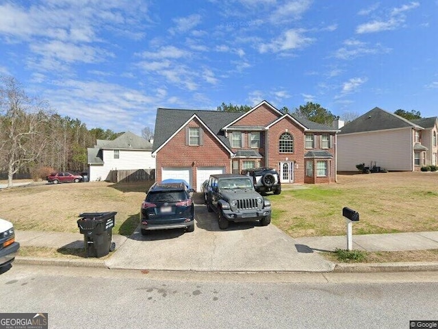 696 Tomahawk Pl, Austell, GA 30168 - view of front facade with asphalt driveway, a front lawn, and brick siding
