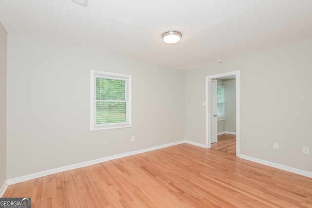 2090 Blackberry Ln, Auburn, GA 30011 - spare room featuring plenty of natural light and light wood finished floors