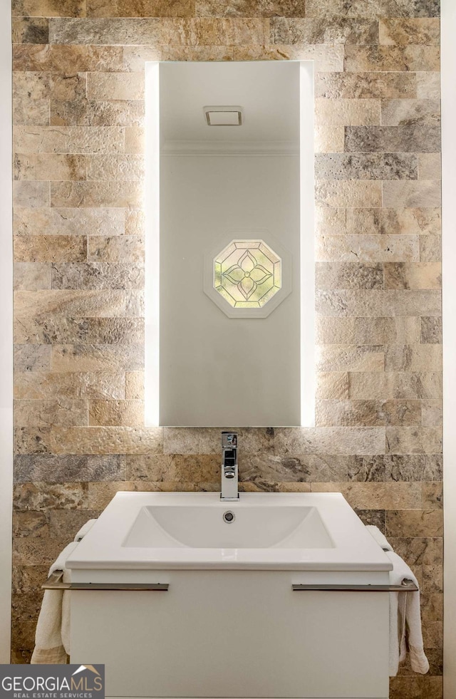 4569 Fountain Dr, Marietta, GA 30067 - bathroom featuring ornamental molding and a sink