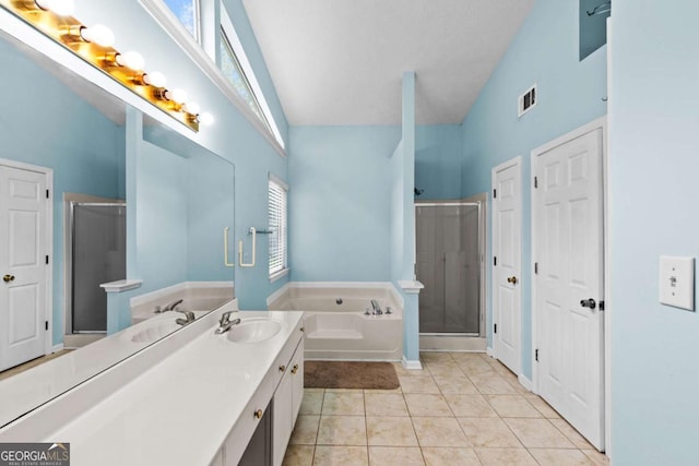 580 Lilburn School Rd, Lilburn, GA 30047 - bathroom with a stall shower, a bath, high vaulted ceiling, vanity, and tile patterned floors