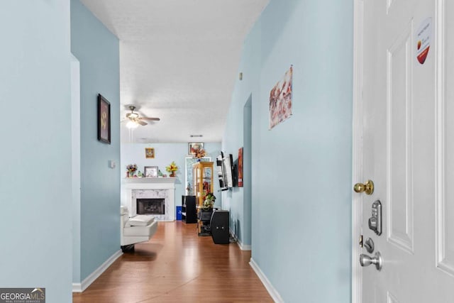 580 Lilburn School Rd, Lilburn, GA 30047 - hall featuring baseboards and wood finished floors