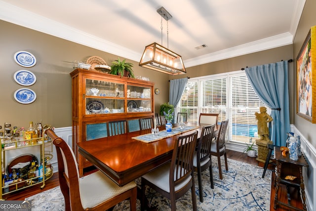 1767 Tidewell Trce, Lawrenceville, GA 30043 - dining area with wood finished floors and crown molding