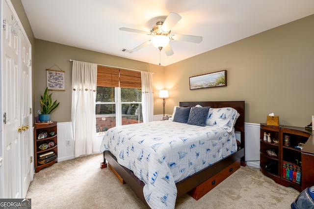 1767 Tidewell Trce, Lawrenceville, GA 30043 - carpeted bedroom featuring wainscoting and ceiling fan