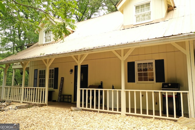 317 Running Deer Rd, Cleveland, GA 30528 - rear view of property with covered porch and a metal roof