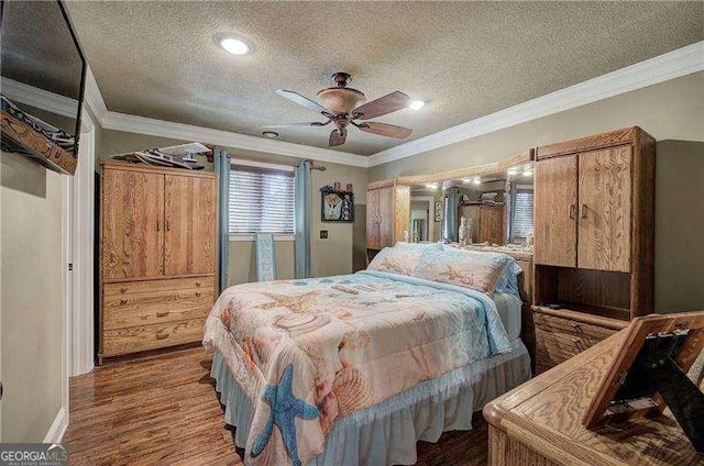 186 Wolverine Dr, Waleska, GA 30183 - bedroom featuring a textured ceiling, crown molding, wood finished floors, a ceiling fan, and recessed lighting