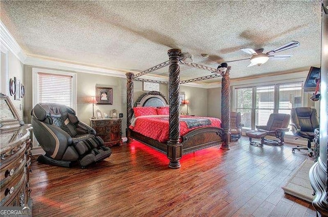 186 Wolverine Dr, Waleska, GA 30183 - bedroom with ornamental molding, multiple windows, a textured ceiling, hardwood / wood-style flooring, and ceiling fan