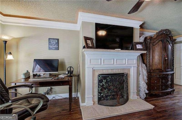 186 Wolverine Dr, Waleska, GA 30183 - living room with crown molding, wood finished floors, a textured ceiling, a desk, and a fireplace