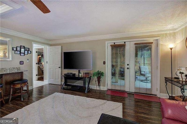 186 Wolverine Dr, Waleska, GA 30183 - living area with french doors, wood finished floors, ornamental molding, and ceiling fan