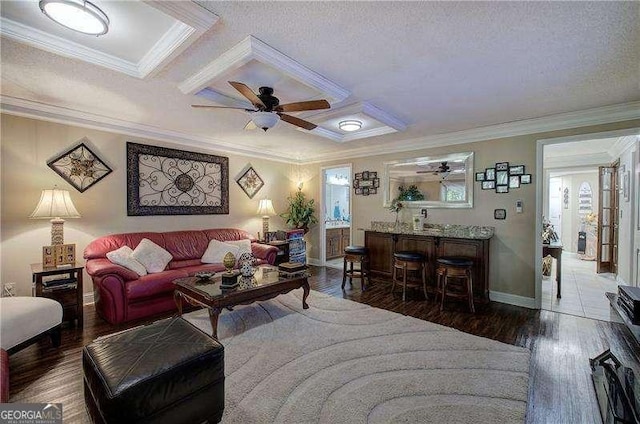 186 Wolverine Dr, Waleska, GA 30183 - living area featuring ceiling fan, crown molding, healthy amount of natural light, wood finished floors, and a textured ceiling