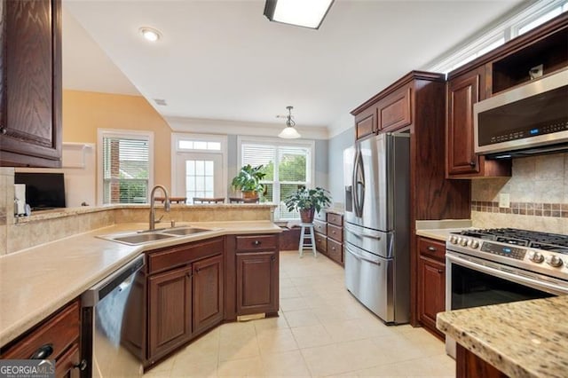 1979 Spivey Vlg, Jonesboro, GA 30236 - kitchen with stainless steel appliances, backsplash, light tile patterned floors, a peninsula, and recessed lighting