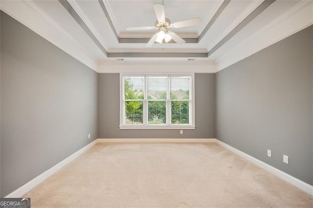 1979 Spivey Vlg, Jonesboro, GA 30236 - unfurnished room with light carpet, crown molding, a raised ceiling, and a ceiling fan