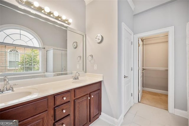 1979 Spivey Vlg, Jonesboro, GA 30236 - full bathroom with double vanity, a shower with shower door, tile patterned floors, a closet, and ornamental molding