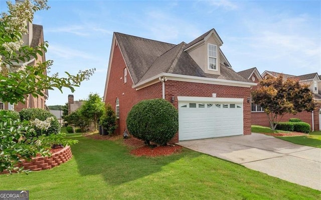 1979 Spivey Vlg, Jonesboro, GA 30236 - view of side of home with concrete driveway, brick siding, and a yard