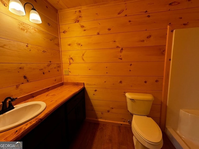 85 Christopher Dr Unit 108, Ellijay, GA 30540 - bathroom featuring wooden walls, wood finished floors, and vanity