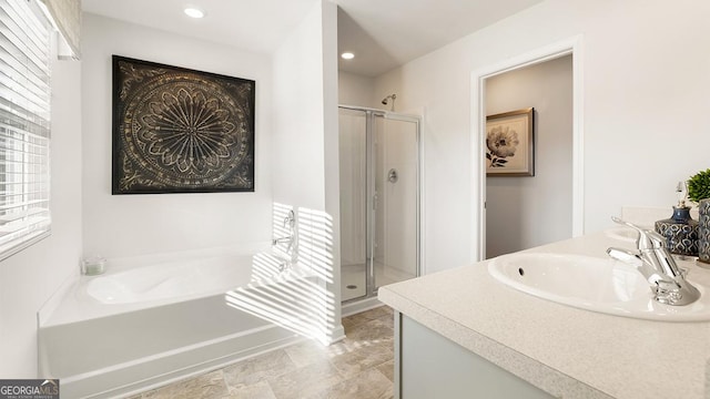 11893 Aukerman Way, Hampton, GA 30228 - full bath with a shower stall, a garden tub, vanity, and recessed lighting