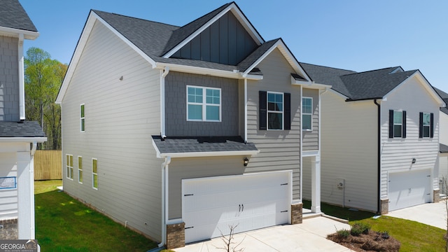 11893 Aukerman Way, Hampton, GA 30228 - craftsman house with an attached garage, board and batten siding, concrete driveway, and roof with shingles