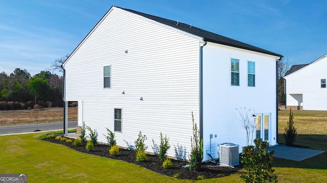 11893 Aukerman Way, Hampton, GA 30228 - view of side of home featuring a yard
