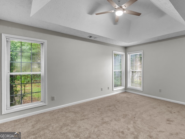 404 Northwind Pl, Stockbridge, GA 30281 - carpeted empty room featuring ceiling fan and plenty of natural light