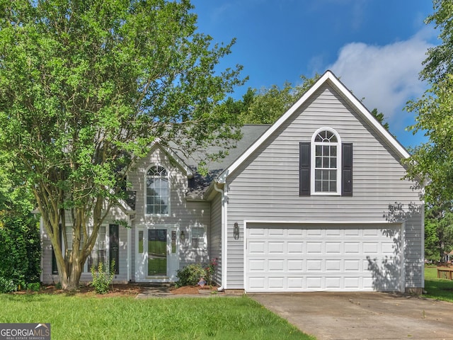 404 Northwind Pl, Stockbridge, GA 30281 - traditional-style house featuring a garage, driveway, and a front yard