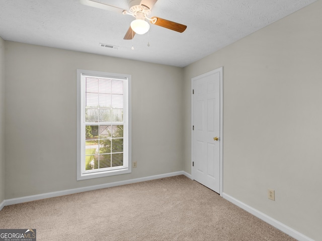 404 Northwind Pl, Stockbridge, GA 30281 - carpeted spare room featuring baseboards and ceiling fan