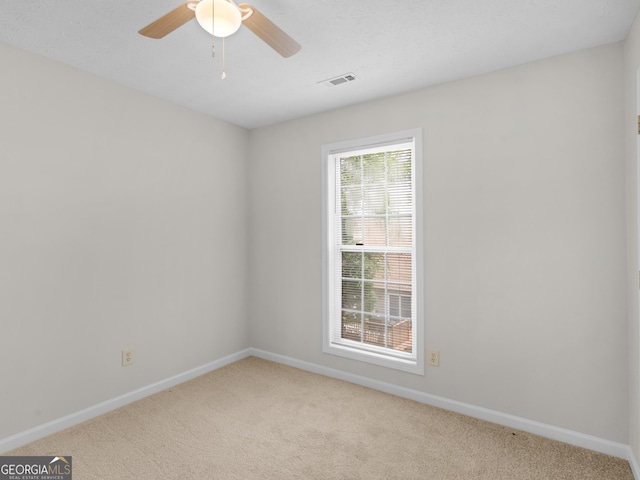 404 Northwind Pl, Stockbridge, GA 30281 - spare room with light colored carpet and ceiling fan