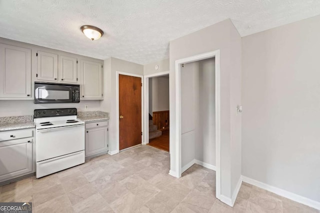 58 6th Ave W, Dallas, GA 30157 - kitchen featuring black microwave, white electric range oven, gray cabinetry, and a textured ceiling