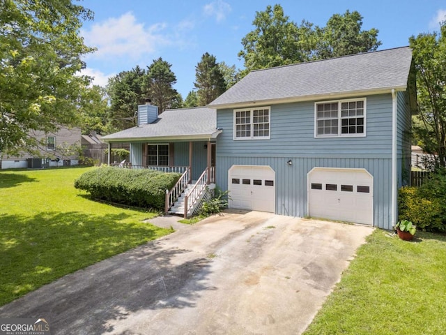 58 6th Ave W, Dallas, GA 30157 - split level home with a chimney, covered porch, a front yard, an attached garage, and concrete driveway