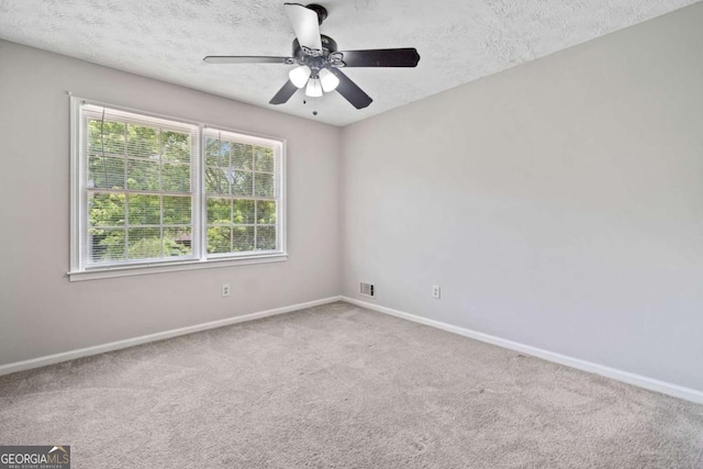 58 6th Ave W, Dallas, GA 30157 - carpeted empty room with a ceiling fan and a textured ceiling
