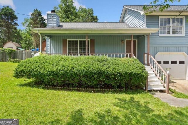 58 6th Ave W, Dallas, GA 30157 - split level home with a porch, an attached garage, a chimney, concrete driveway, and roof with shingles