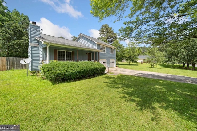 58 6th Ave W, Dallas, GA 30157 - tri-level home featuring a chimney, concrete driveway, and a garage