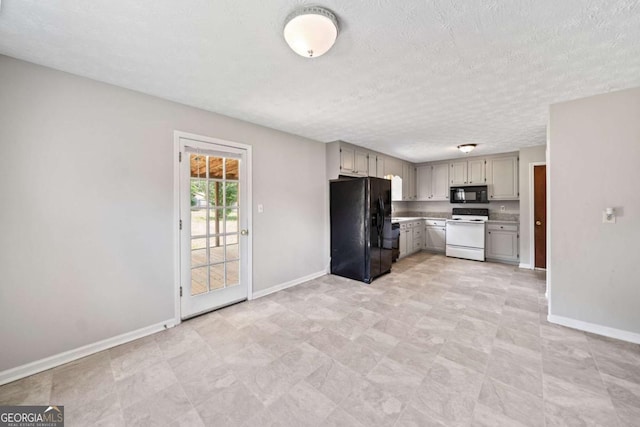 58 6th Ave W, Dallas, GA 30157 - kitchen featuring black appliances, light countertops, a textured ceiling, and gray cabinetry
