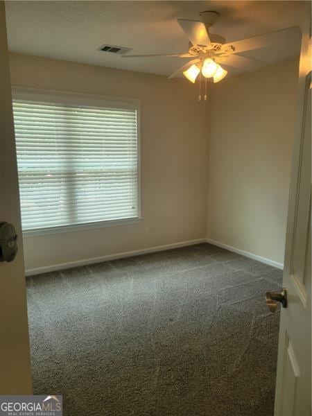 13565 Weycroft Cir, Alpharetta, GA 30004 - empty room with carpet flooring and ceiling fan