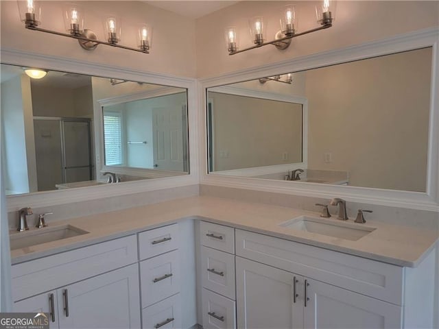 13565 Weycroft Cir, Alpharetta, GA 30004 - bathroom with double vanity and a stall shower