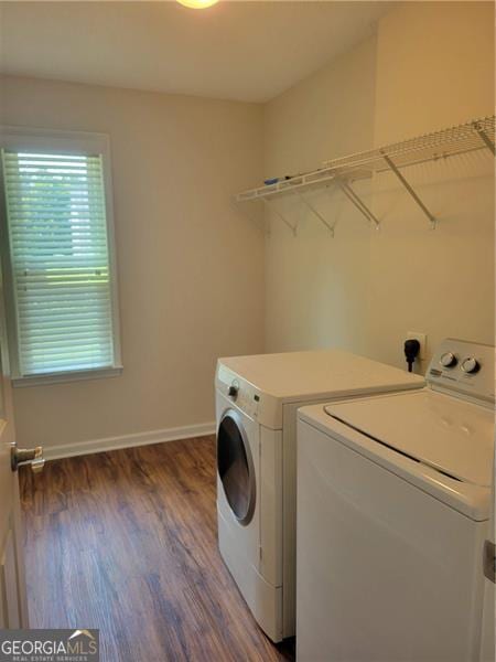 13565 Weycroft Cir, Alpharetta, GA 30004 - laundry room featuring washer and dryer and wood finished floors