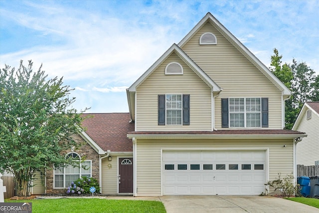 375 Shadetree Ln, Lawrenceville, GA 30044 - traditional home featuring concrete driveway and an attached garage