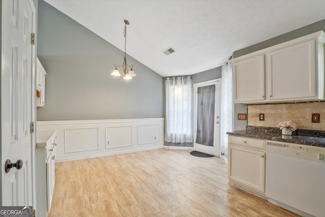 375 Shadetree Ln, Lawrenceville, GA 30044 - kitchen featuring dishwasher, tasteful backsplash, a chandelier, decorative light fixtures, and lofted ceiling