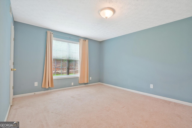 375 Shadetree Ln, Lawrenceville, GA 30044 - empty room featuring carpet and a textured ceiling