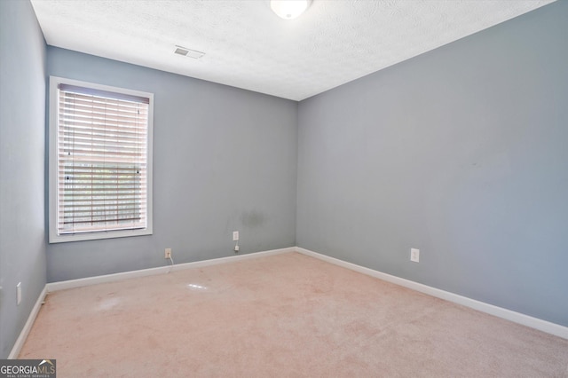 375 Shadetree Ln, Lawrenceville, GA 30044 - carpeted spare room with baseboards and a textured ceiling