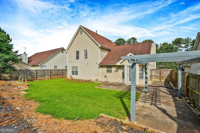 375 Shadetree Ln, Lawrenceville, GA 30044 - back of house with a pergola, a patio area, a fenced backyard, and a chimney