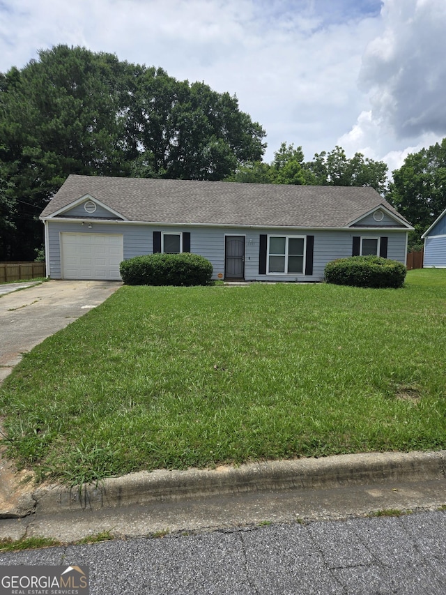 2985 Garnet Way S, Fulton, GA 30349 - ranch-style home with a garage, driveway, and a front lawn