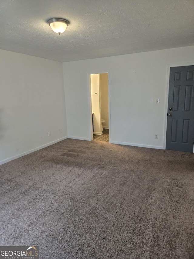 2985 Garnet Way S, Fulton, GA 30349 - empty room featuring carpet flooring and a textured ceiling