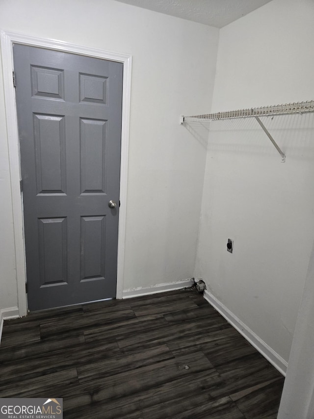 2985 Garnet Way S, Fulton, GA 30349 - laundry room with dark wood-type flooring and electric dryer hookup