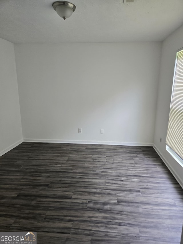 2985 Garnet Way S, Fulton, GA 30349 - unfurnished room featuring dark wood-style flooring