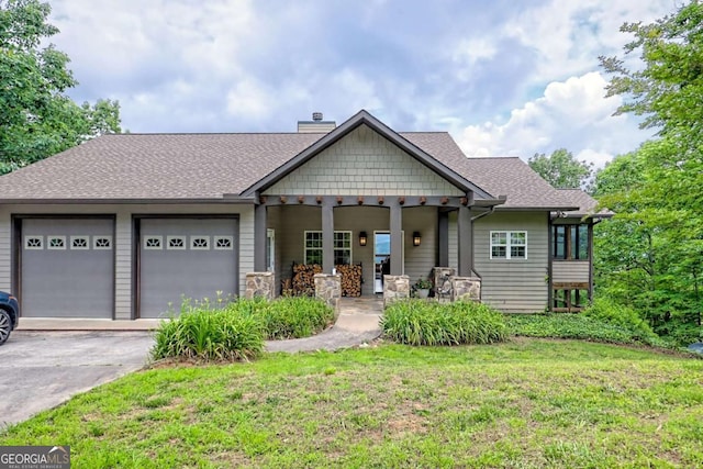 990 Hickory Nut Mountain Rd, Tallulah Falls, GA 30573 - view of front of property with a garage, driveway, a front yard, and a chimney