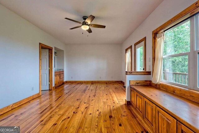 990 Hickory Nut Mountain Rd, Tallulah Falls, GA 30573 - spare room featuring light wood-style flooring and a ceiling fan