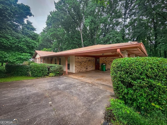 4714 Darlene Way, Tucker, GA 30084 - view of parking / parking lot with concrete driveway and an attached carport