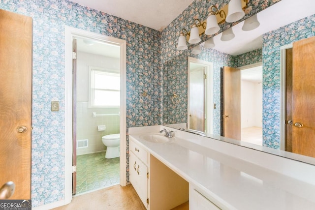 4714 Darlene Way, Tucker, GA 30084 - bathroom with wallpapered walls, vanity, and tile patterned floors