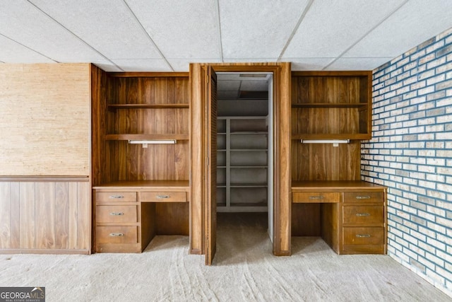 4714 Darlene Way, Tucker, GA 30084 - unfurnished office with a drop ceiling, wood walls, light carpet, built in features, and built in study area