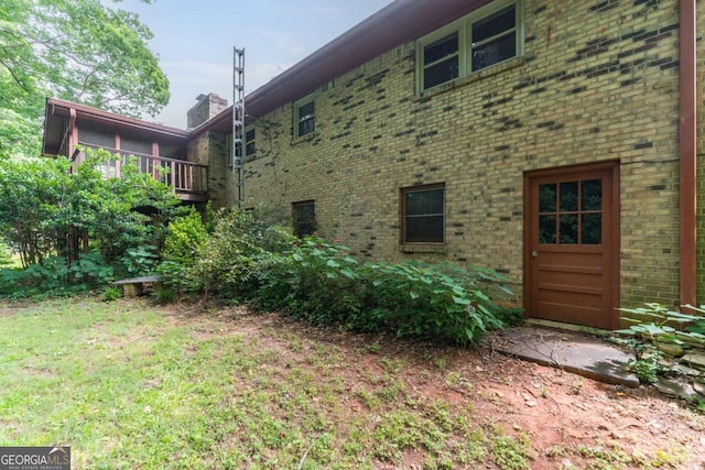 4714 Darlene Way, Tucker, GA 30084 - view of home's exterior with brick siding and a chimney