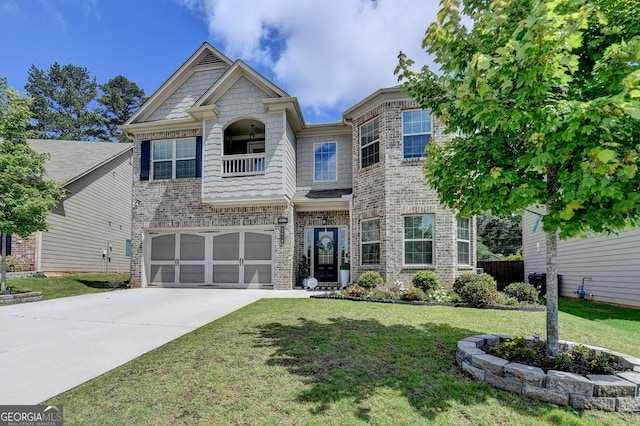 2410 Melton Common Dr, Dacula, GA 30019 - view of front facade with driveway, a garage, a balcony, and brick siding
